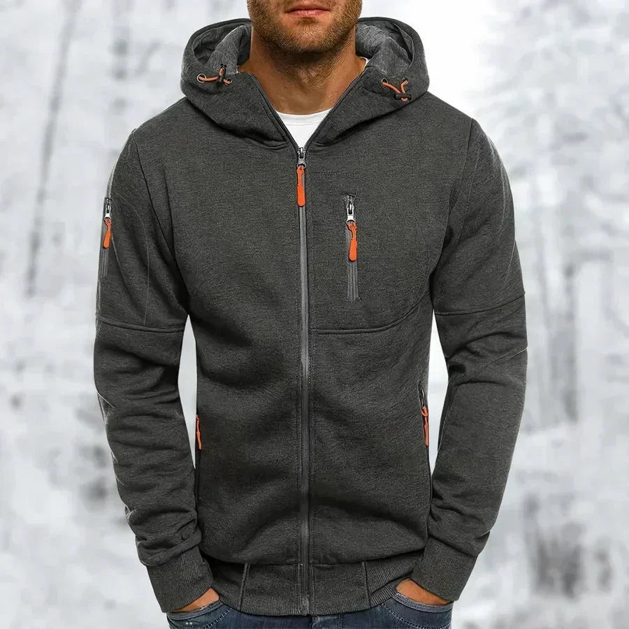 Dunkelgrauer Reißverschluss-Kapuzenpullover mit orangefarbenen Reißverschlusszügen und gerippten Bündchen, andere Ansicht.