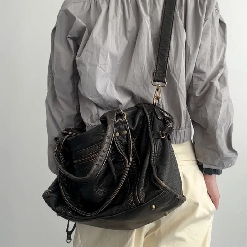 Schwarze Lederhandtasche, lässig, Umhängetasche, Damenmode, Vintage-Stil, robust.