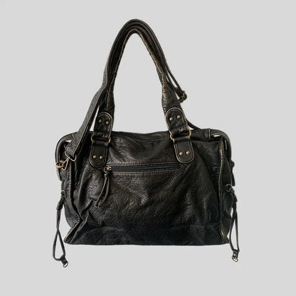 Schwarze Lederhandtasche mit Reißverschluss, modisch, Damenaccessoire, elegant, robust.