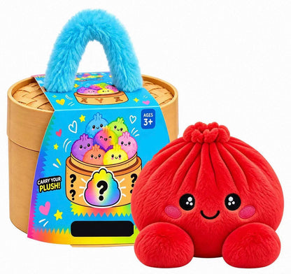 Roter Plüschknödel mit lächelndem Gesicht neben der runden Bambuskorb-Geschenkbox mit blauem Plüschhenkel und bunter 22