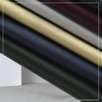 Mehrfarbige Stoffrollen, Textilien, Baumwolle, Schwarz, Blau, Beige, Grau, Burgunderrot, Nahaufnahme.