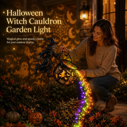 Halloween Hexenkessel Gartenlampe mit buntem Lichterstrom auf dem Gartenstab