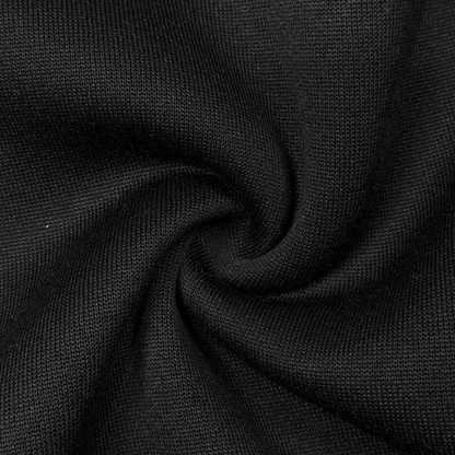 Schwarzer Baumwollstoff, Nahaufnahme, weiche Textur, ideal für Bekleidung und Heimtextilien.
