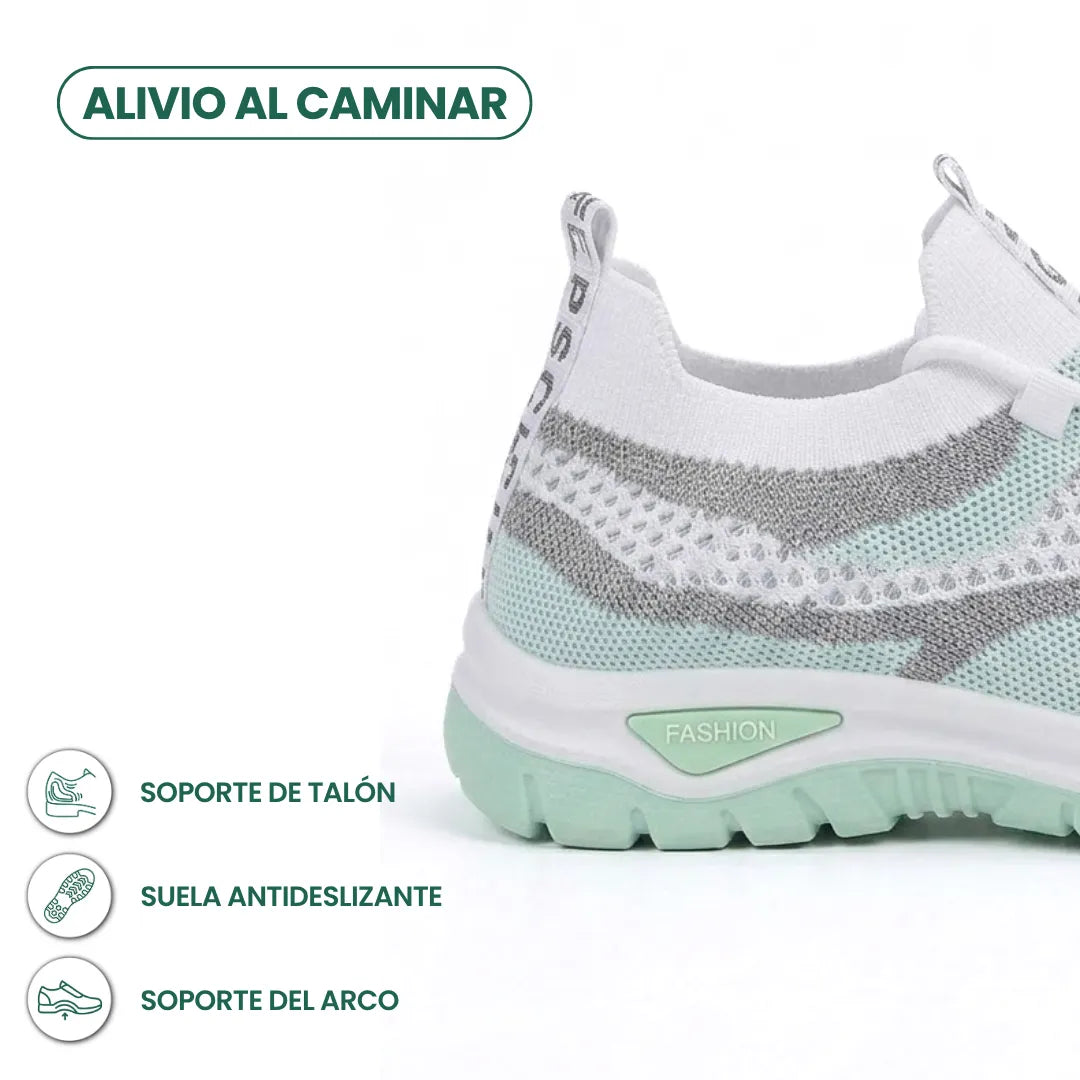 Detailaufnahme der Ferse des weiß-mintgrünen Sneakers mit Symbolen zu Fersenhalt, rutschfester Sohle und Fußgewölbestütze.
