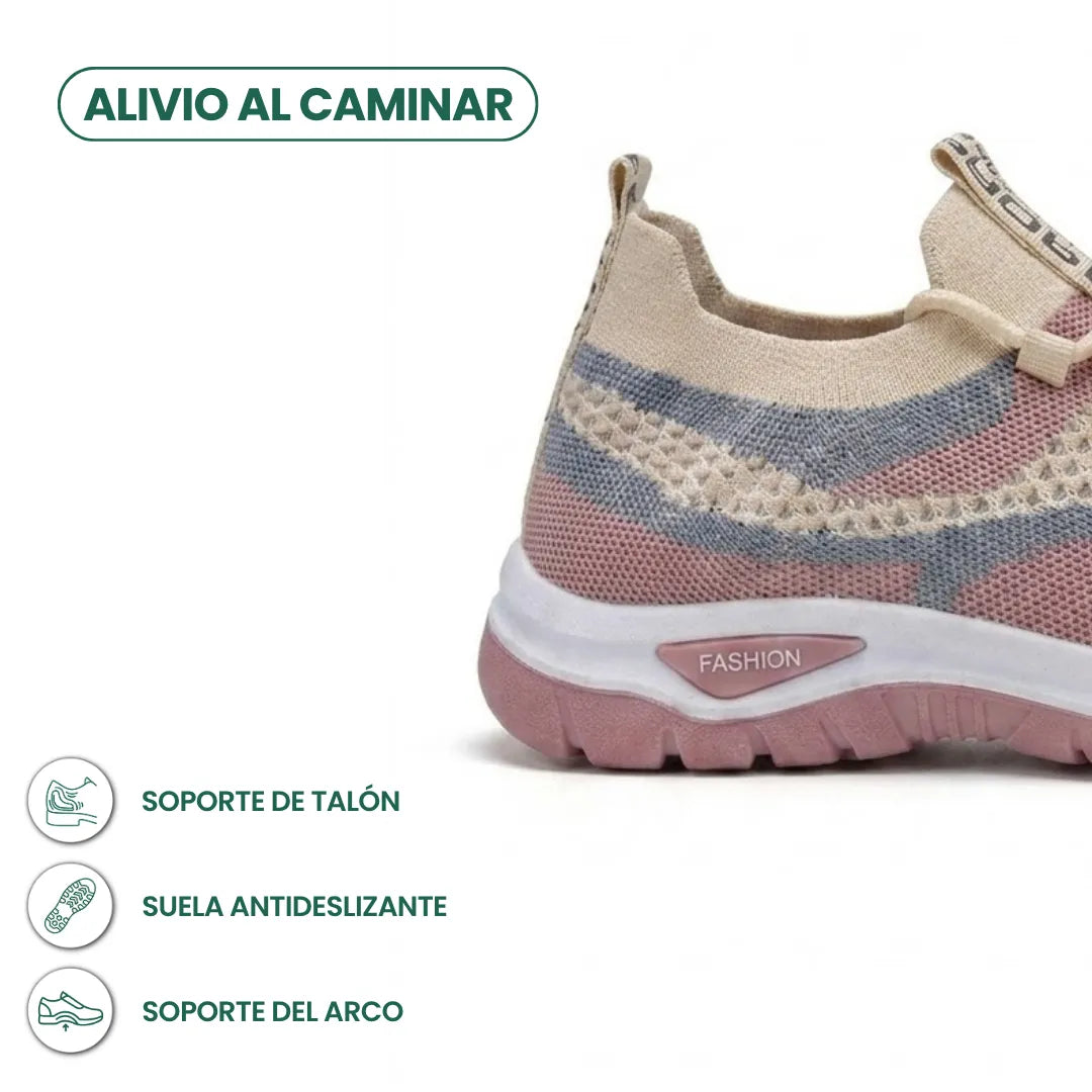 Fersenpartie des beigen Sneakers mit rosa und blaugrauen Streifen, dazu Symbole für Fersenhalt, rutschfeste Sohle und Gewölbestütze 31