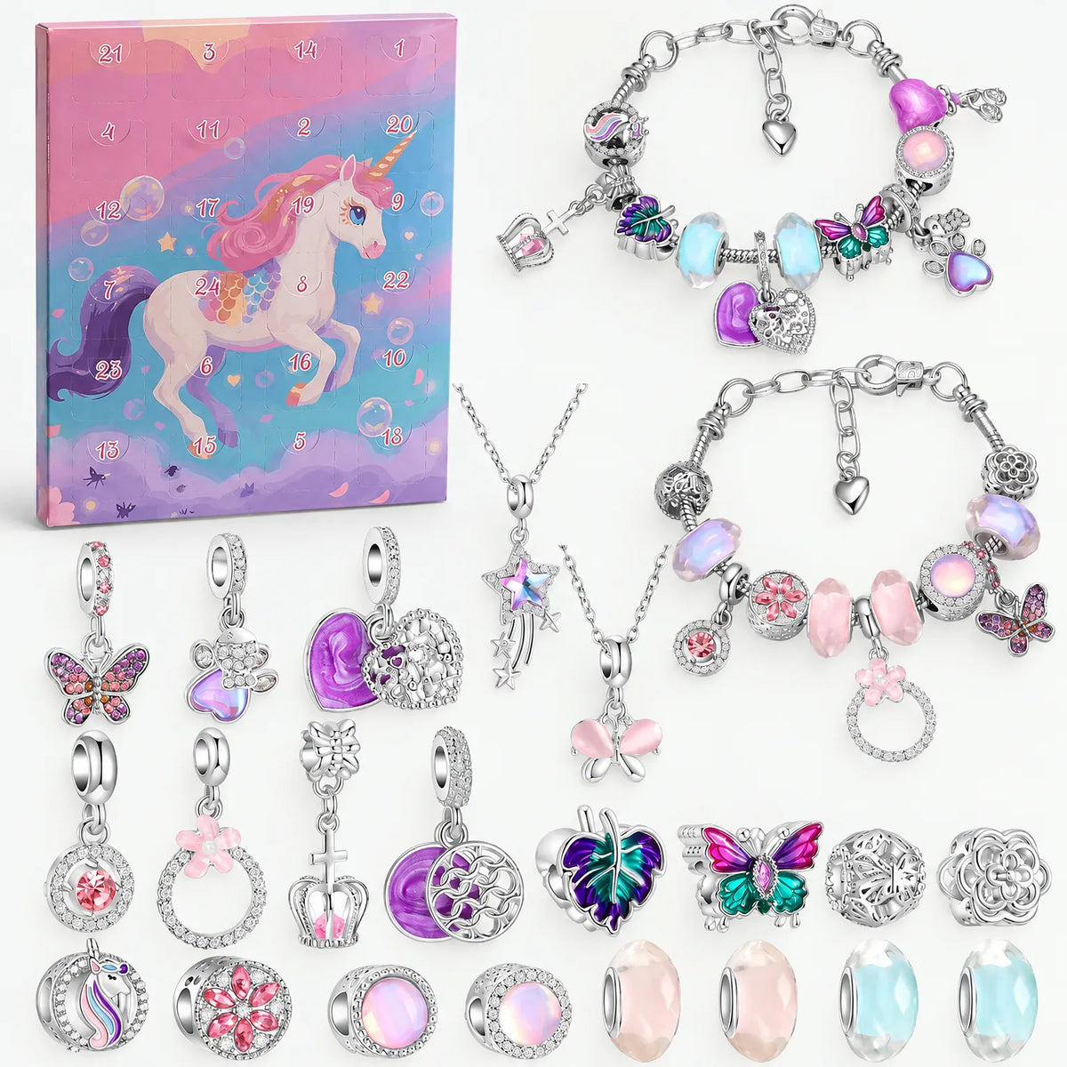 Einhorn-Variante mit bunter Schachtel, zwei Armbändern, zwei Halsketten sowie Schmetterlings-, Herz- und Kronen-Charms in Rosa, Lila und Hellblau. 8
