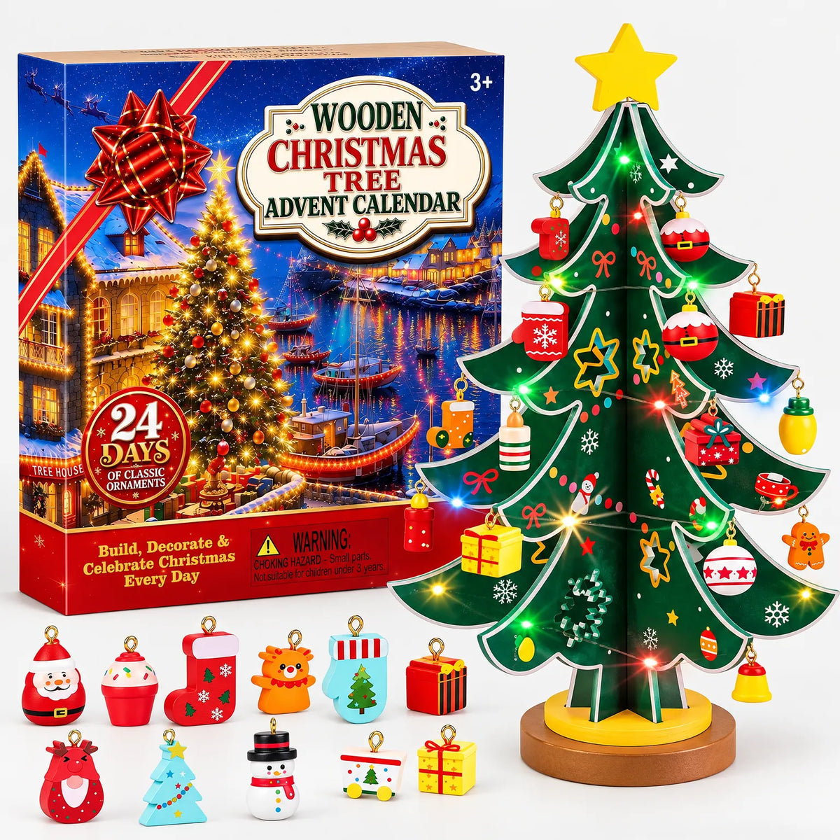 Grüner Holzbaum mit gelbem Stern, Lichterkette und bunten Anhängern vor der Verpackung, davor elf einzelne Figuren 2