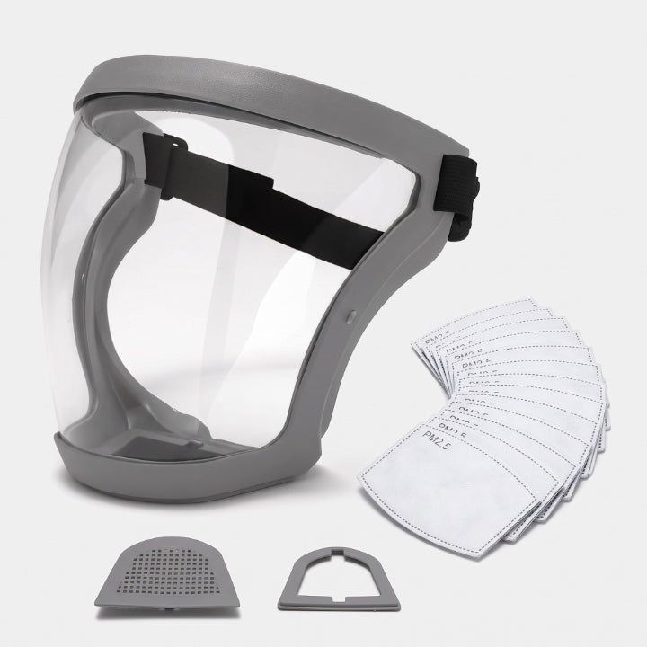 Graue Vollgesichtsmaske mit klarem Visier und schwarzem Kopfband, daneben aufgefächerte Ersatzfilter und zwei graue Filterhalterungen. 6