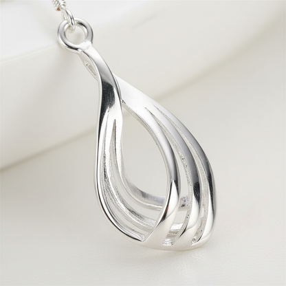 Hängende Tropfenohrringe - DropCharm 