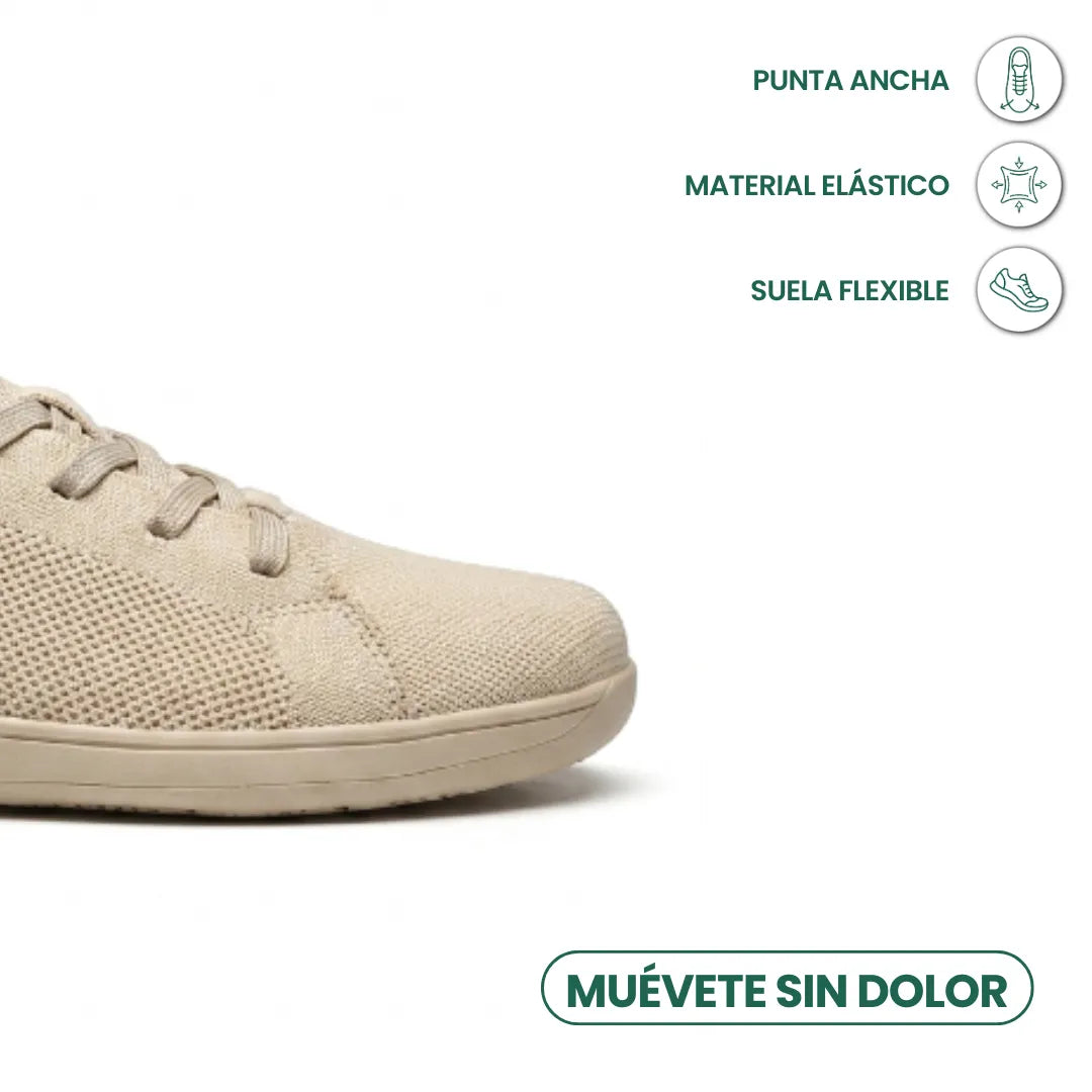 Beiger Sneaker, Zehenbereich im Anschnitt, daneben Symbole zu breiter Spitze, elastischem Material und flexibler Sohle. 5