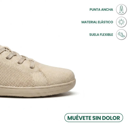 Beiger Sneaker, Zehenbereich im Anschnitt, daneben Symbole zu breiter Spitze, elastischem Material und flexibler Sohle. 5