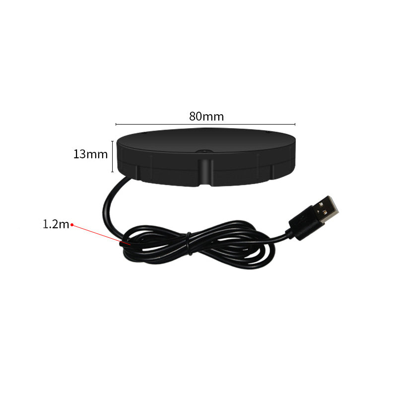 Schwarze flache Ladescheibe mit USB-Kabel und eingezeichneten Maßangaben.