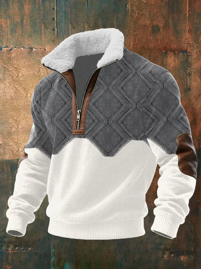 Strickjacke in Grau und Weiß mit Rautenmuster vor rostiger Metallwand, Reißverschluss und Teddyfutter-Kragen 2