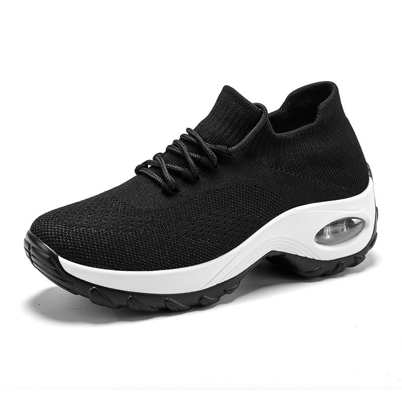 Schwarzer Sneaker mit weißer Sohle, atmungsaktiv, sportlich, für Damen und Herren.