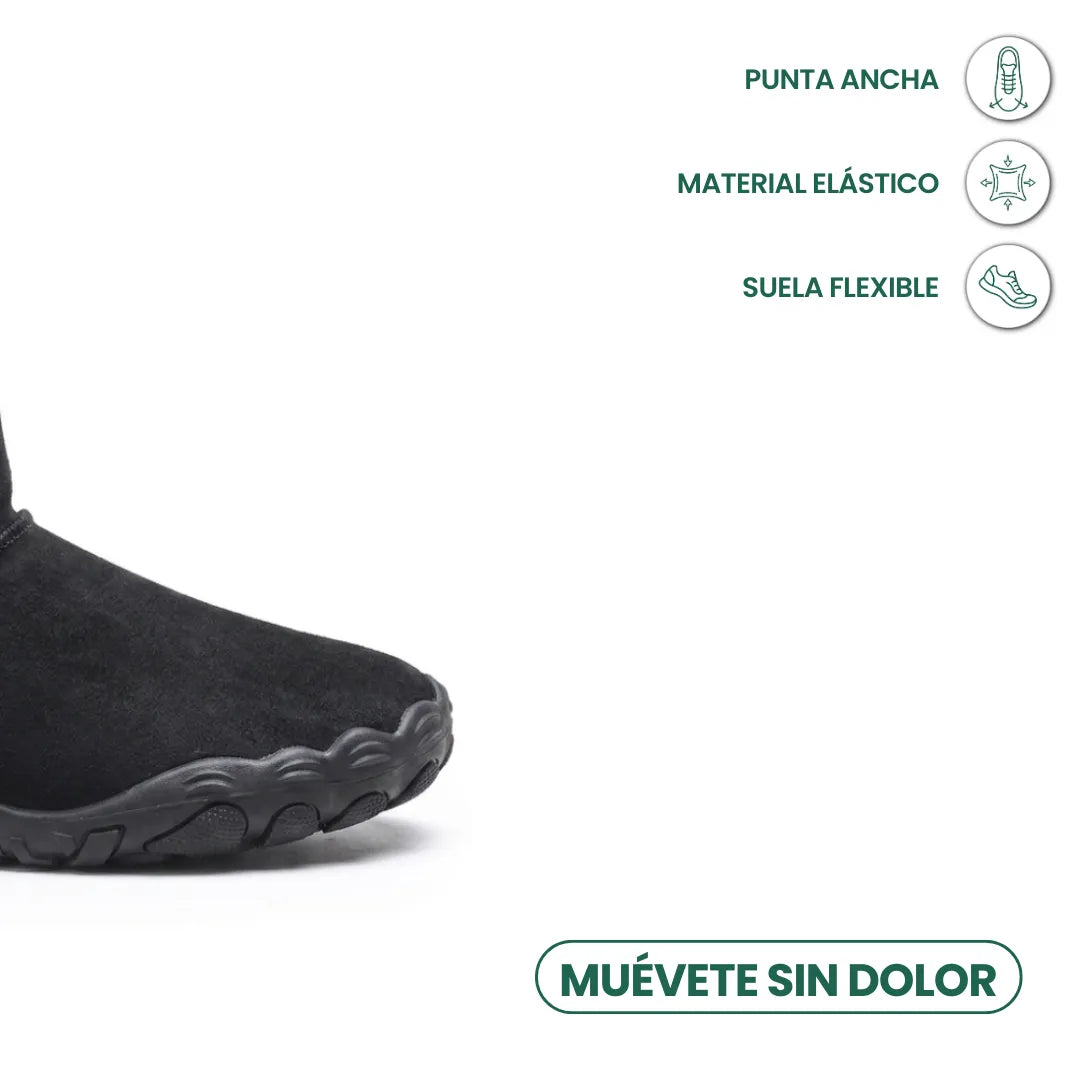 Vorderer Teil des schwarzen Stiefels mit breiter Zehenbox, daneben Symbole für flexible Sohle und elastisches Material 14
