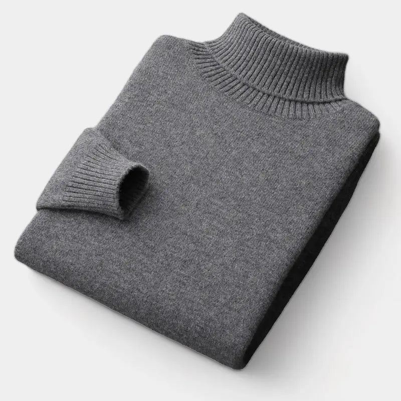 Dunkelgrauer Rollkragenpullover, ordentlich gefaltet, mit gerippten Ärmelbündchen und Kragen 3
