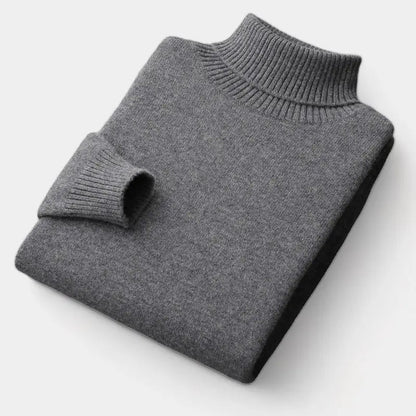 Dunkelgrauer Rollkragenpullover, ordentlich gefaltet, mit gerippten Ärmelbündchen und Kragen 3