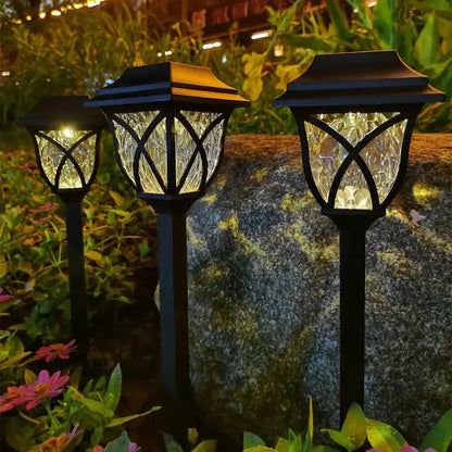 Schwarze Solar-Gartenleuchten, LED, wetterfest, dekorativ, beleuchten Blumenbeet bei Nacht.