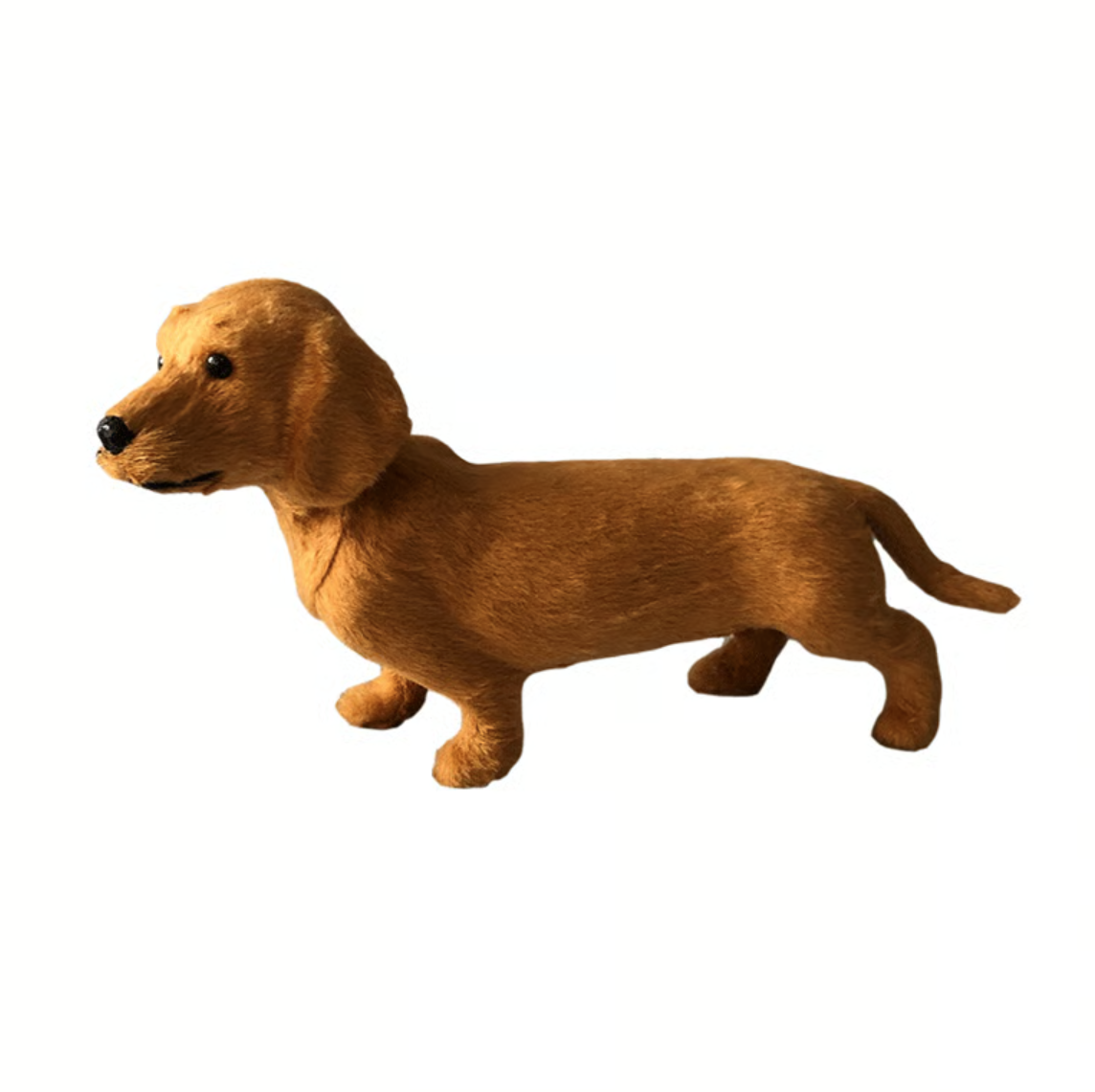 Goldener Plüschhund aus Polyester in Seitenansicht mit weichem Fell.