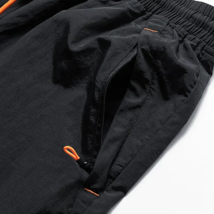 Herren Laufshorts mit Mesh-Innenshorts und Reißverschlusstaschen – Nikoas