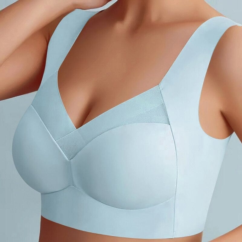 Hellblauer BH mit breiten Trägern und Mesh-Einsatz, Nahaufnahme am Model mit erhobenem Arm 3