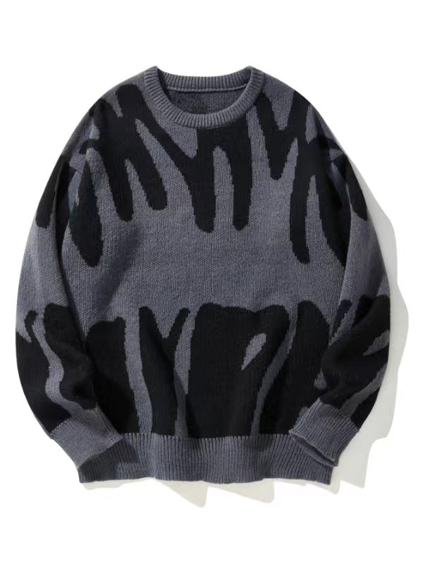 Strickpullover mit abstraktem Muster in Schwarz auf grauem Grund, flach von vorn fotografiert 1