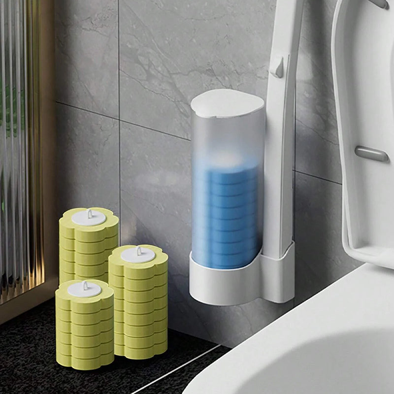 Spender mit blauen Aufsätzen an der Wand neben der Toilette