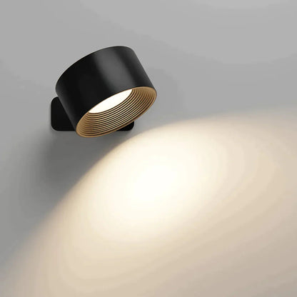 Schwarze kabellose LED-Wandleuchte, Detail mit zylindrischem Leuchtenkopf