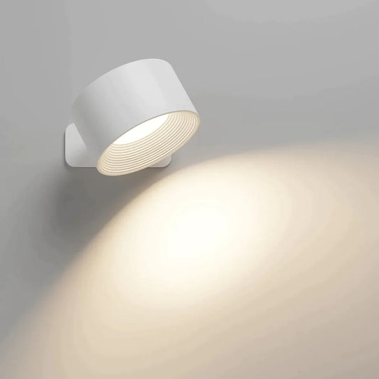 Schwarze kabellose LED-Wandleuchte mit 360°-Drehung, frontale Ansicht