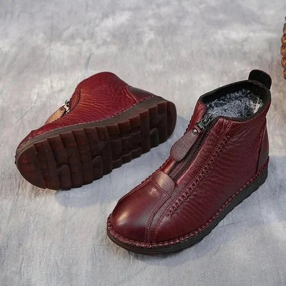 Warme, rutschfeste, bequeme, rote Lederstiefel mit Reißverschluss für Damen.