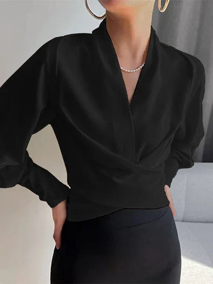 Elegante schwarze Damenbluse mit V-Ausschnitt, langen Puffärmeln, tailliert, 2023 Mode.