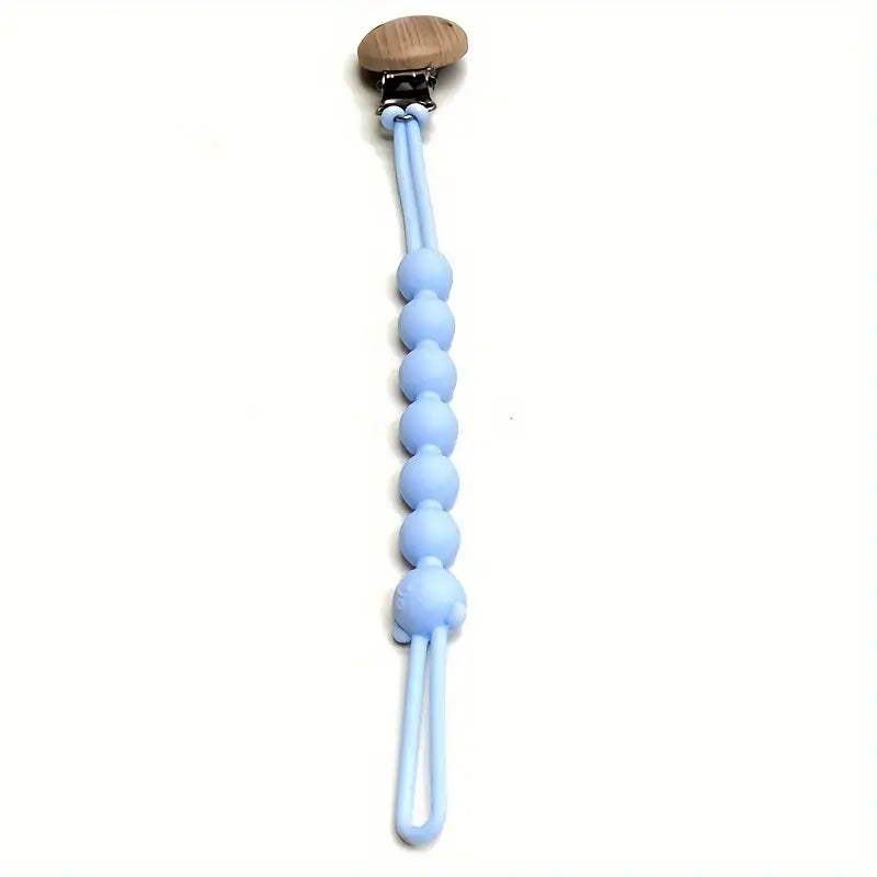 Hellblaue Silikon-Schnullerkette mit Holzclip, Babyzubehör, BPA-frei, sicher und langlebig.