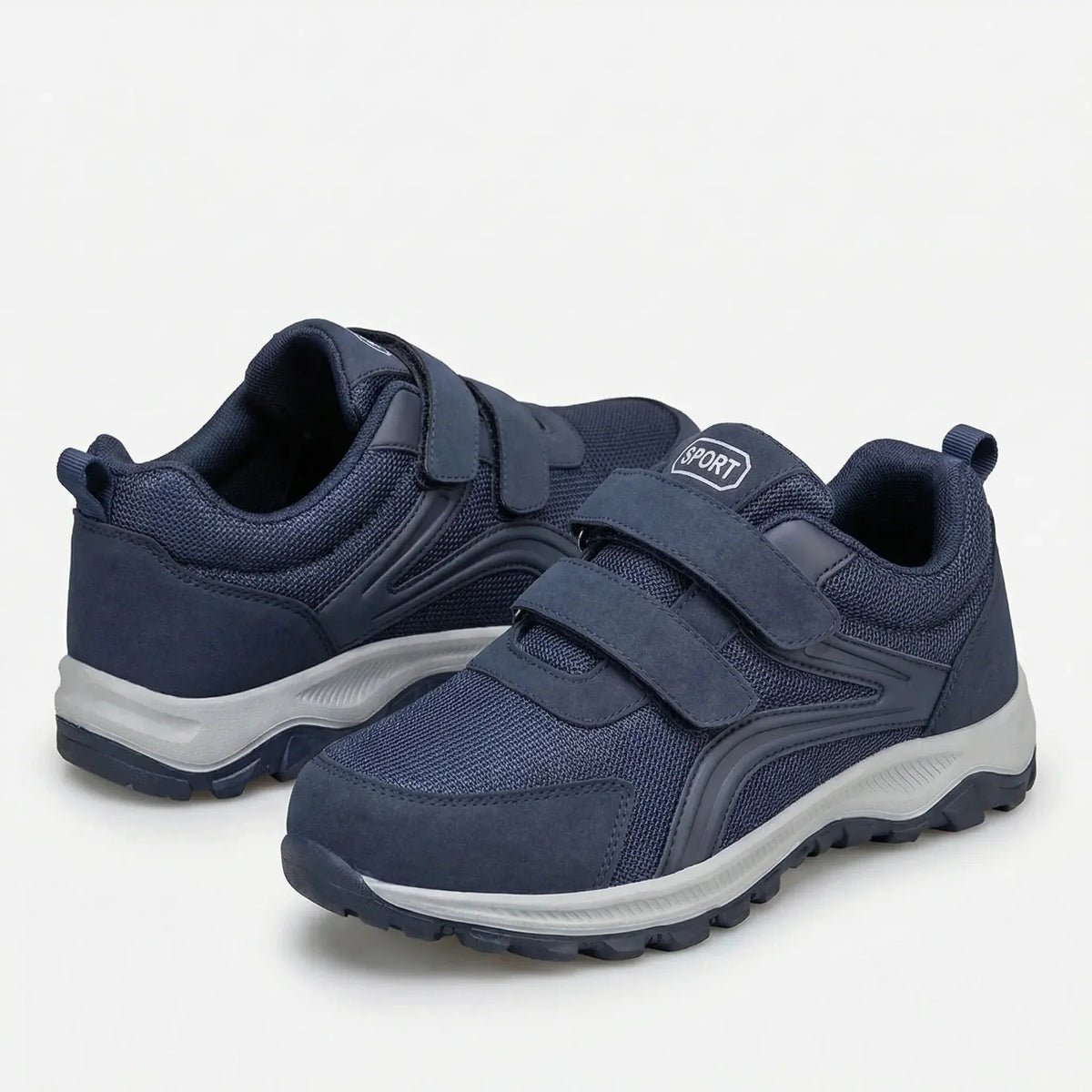 Paar blaue Klettschuhe mit heller Sohle, ein Schuh mit Blick in den Schaft 9