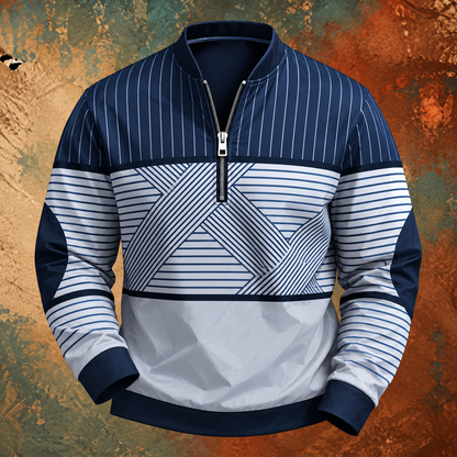 Pullover in Marineblau und Weiß mit Nadelstreifen am Oberteil und geometrischem Streifenmuster, vor farbigem Strukturhintergrund frontal dargestellt. 2