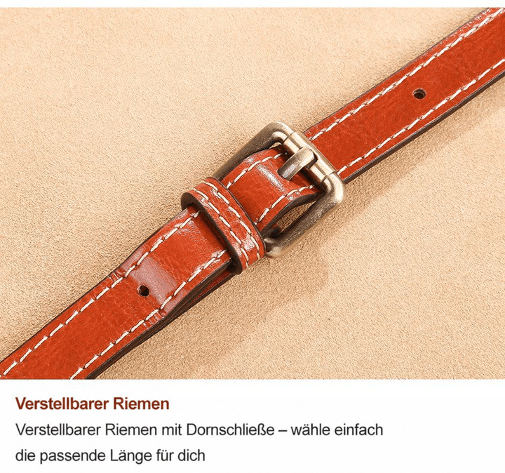 Detailaufnahme des verstellbaren Gurts aus braunem Leder mit Dornschnalle und Ziernähten 12
