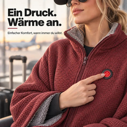 Nahaufnahme der roten Waffelstrick-Decke mit grauem Teddyfutter, ein Finger drückt den Einschaltknopf auf der Brust 9