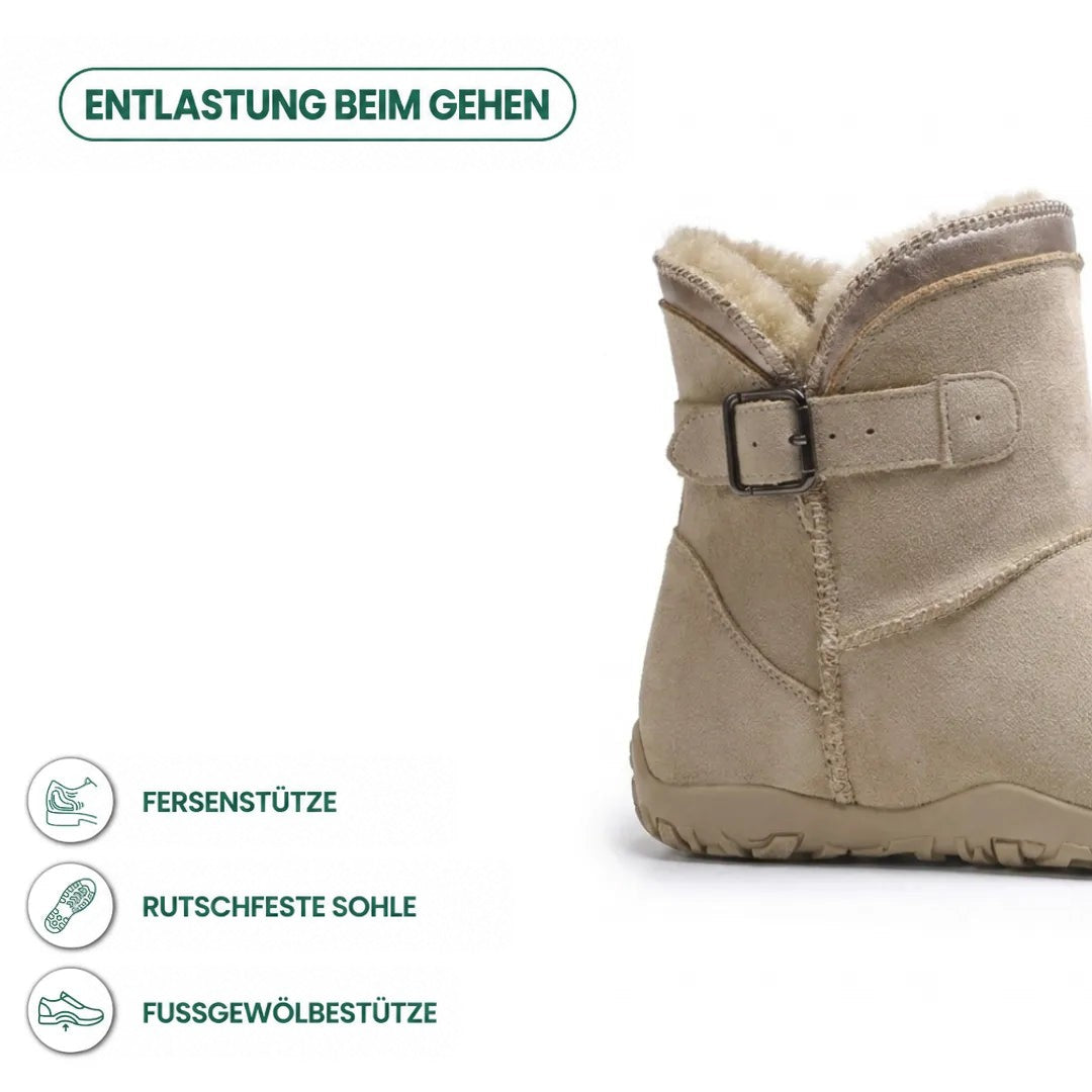 Beiger Stiefel mit Schnalle im Detail, daneben Symbole für Fersenhalt, rutschfeste Sohle und Fußgewölbe-Unterstützung 4