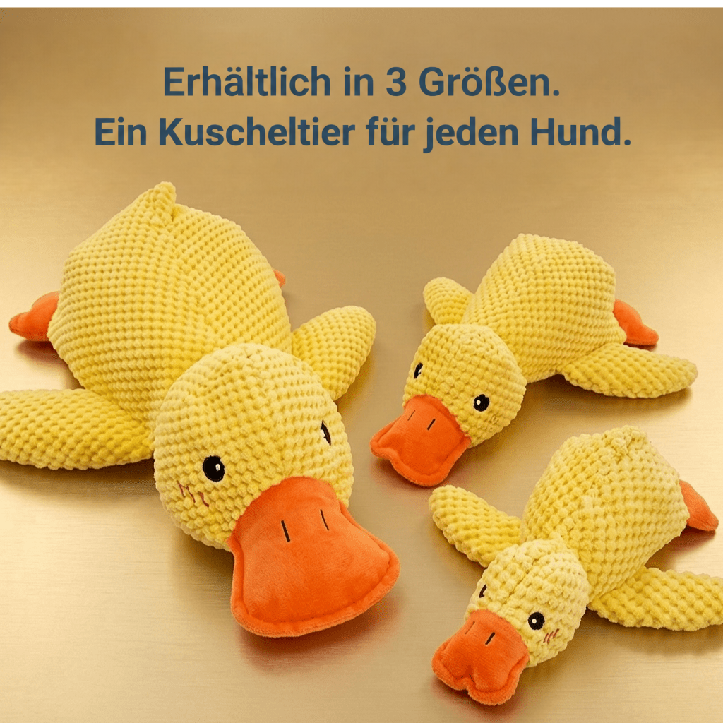Drei gelbe Plüschenten in drei verschiedenen Größen liegen nebeneinander auf glänzendem goldenem Untergrund 4