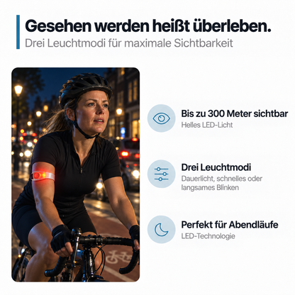 Radfahrerin mit Helm trägt nachts in der Stadt ein rot leuchtendes Armband am Oberarm 3