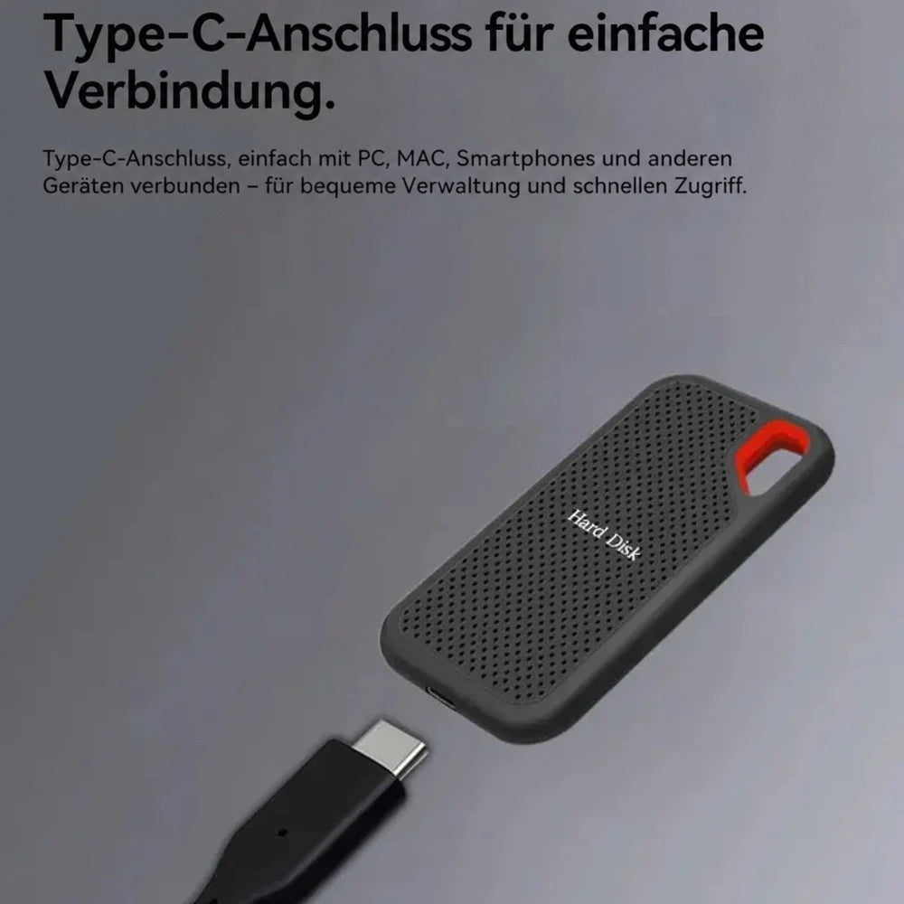USB-C-Stecker kurz vor dem Anschluss an die schwarze SSD mit roter Öse 3
