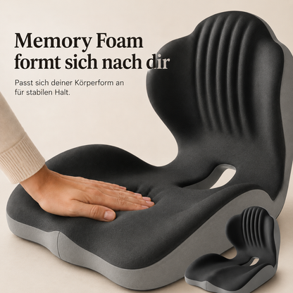 Hand drückt auf die Sitzfläche des dunkelgrauen Kissens und zeigt den nachgebenden Memory-Schaum 3