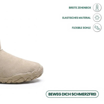 Vorderer Teil des beigen Stiefels mit breiter Zehenbox, daneben Symbole für flexible Sohle und elastisches Material 5
