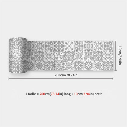 Aufgerollter Streifen mit grau-weißen Ornamentfliesen im Vintage-Stil, mit Maßangaben 57
