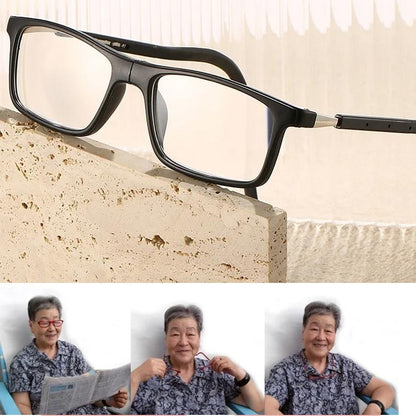 Schwarze Lesebrille mit Nackenband, daneben eine ältere Frau beim Lesen einer Zeitung.
