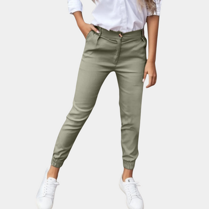 Grüne Damenhose, schmal geschnitten, elastischer Bund, Freizeitmode, Baumwolle.