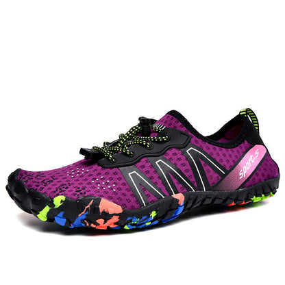 Lila Sportschuh für Damen, atmungsaktiv, rutschfest, mit bunten Sohlen, ideal zum Laufen.