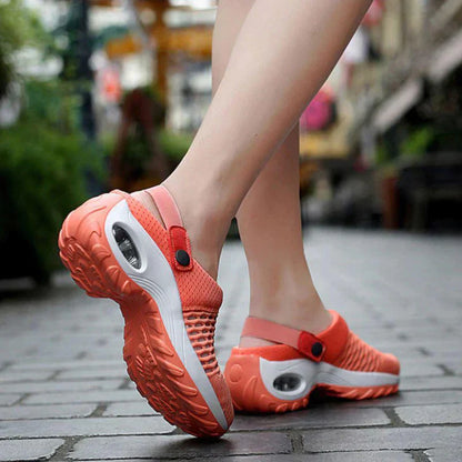 Damen-Sneaker in Orange, atmungsaktiv, rutschfest, ideal für Outdoor-Aktivitäten.