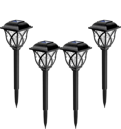 Vier schwarze Solar-Gartenleuchten, LED, wetterfest, energiesparend, für Außenbereich.
