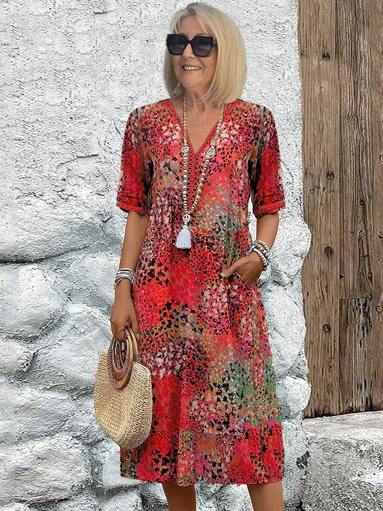 Schickes Midi-Kleid in Rot mit buntem Tupfenmuster, V-Ausschnitt und Halbarm