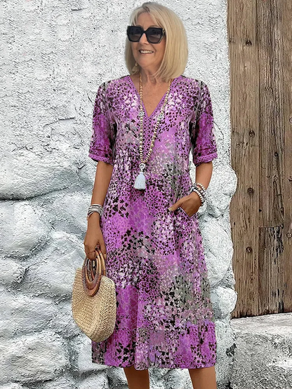 Schickes Midi-Kleid in Violett mit Tupfenmuster, V-Ausschnitt und Halbarm